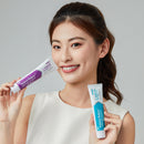 A lady holds a tube of YNBY JinKouJian Fresh Mint Toothpaste and Refreshing Lime toothpaste.