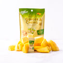 A piece of Prince of Peace Ginger Candy (Chews) Mango with mango cubes in front of a package.