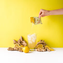 Prince of Peace Instant Lemon Ginger Honey Crystals in a cold drink.