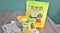 A glass of Ginger Coconut Mango Sago dessert with Prince of Peace Ginger Coconut Instant Beverage packages.