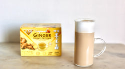 A box of Prince of Peace Ginger Honey Crystal with a glass of Ginger Coffee