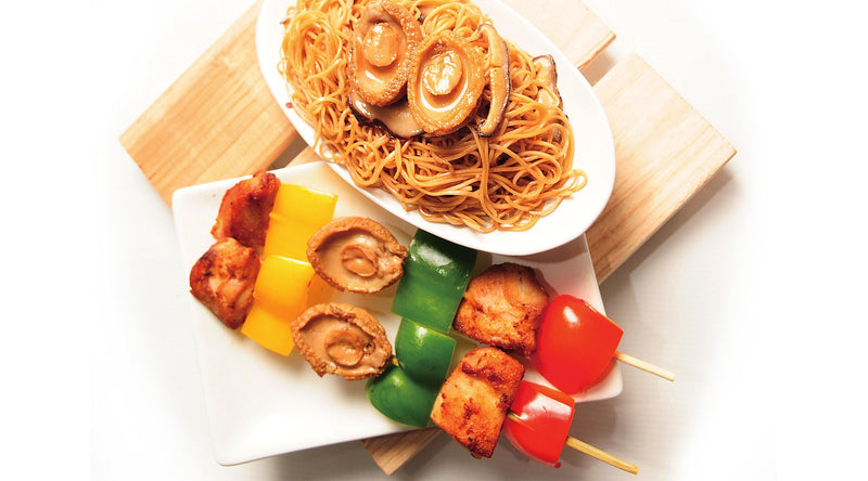 BBQ Abalone and chicken skewers with a bowl of abalone instant noodles.