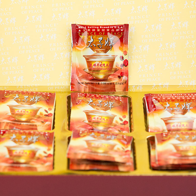 An individual Tea bag of Prince of Peace American Ginseng Rose Tea stands on a tray.