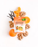 Ginger soft chews package with ginger root and orange slices on a white background