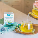 A package of Imperial Green Tea, A teapot is pouring tea into a glass cup.