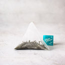 A Prince of Peace Imperial Green Organic Whole Leaf Tea trigonal tea bag