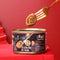 Abalones In Black Truffle Sauce on a red background.