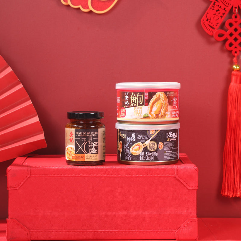 3 flavor of the giftpack: Abalone In Black Truffle Sauce, Braised Abalone and XO Sauce on a red background.