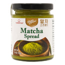 A jar of Prince of Peace Matcha Spread, featuring a black lid and a cream-colored label with green text and an illustration of matcha powder in a wooden bowl. The brand 'Cookstar' is also visible on the label.