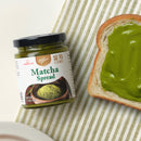 A jar of Matcha Spread with a toast.