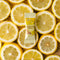 A piece of Prince of Peace Ginger Candy (Chews) with Lemon in front of some lemon slices.