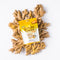 A package of Prince of Peace Ginger Chews Plus+, Original, 3oz in front of gingers.