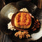 A Wing Wah 2 Yolks Assorted Nuts Mooncake with nuts aside.