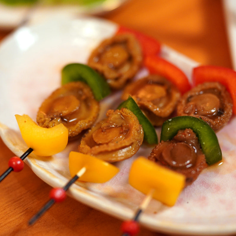 On Kee abalone BBQ with sweet peppers skewers.