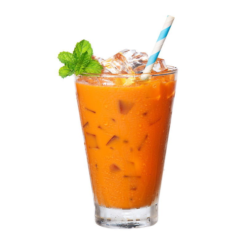 A glass of Prince of Peace 3-in-1 Thai Tea on ice with a pepper mint leaves and a strew.